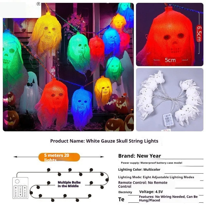 Halloween battery-powered coloured LED string lights on a plastic spool with battery box, options for 1.5m or 2.5m length.
