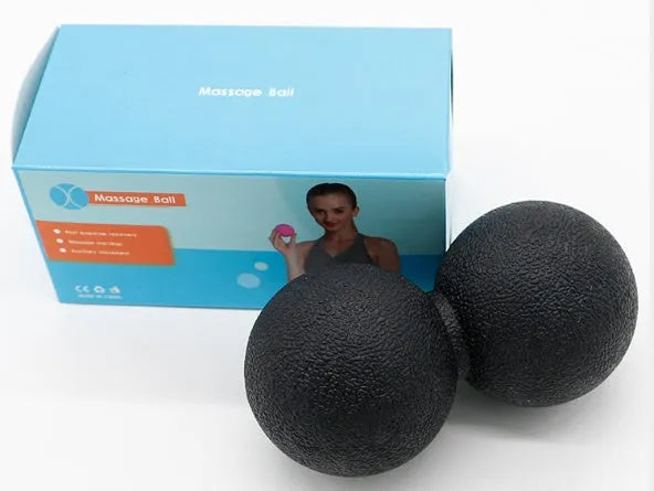 High density peanut massage ball in black on a white background, portable muscle relief tool