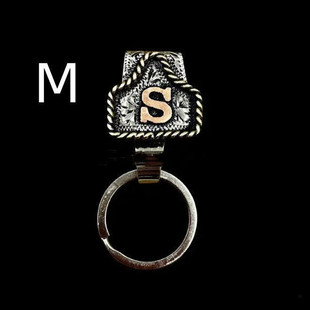 Handmade stainless steel cow tag belt key holder with engraved number plate on a split ring.