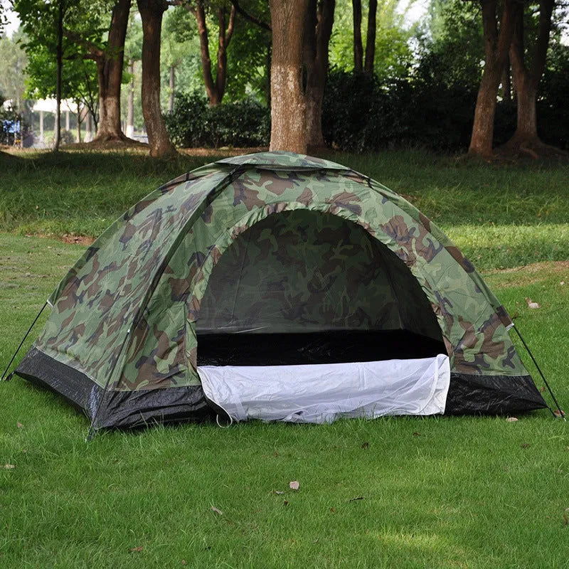 Green camouflage camping tent with mesh windows and steel ground pegs