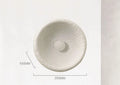 Japanese-style simple modern wall lamp with round resin shade in warm light