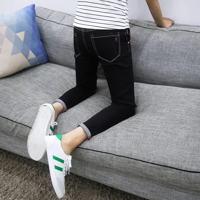 Men's autumn black ripped ankle jeans with micro elastic denim, youth-style tapered fit