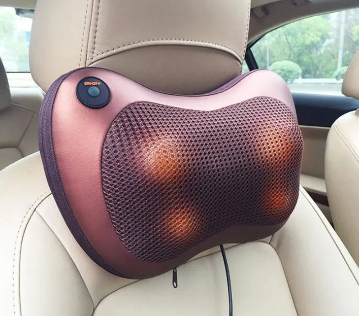 Electric infrared kneading massage pillow in black PU leather with control buttons and adjustable fixing strap for car seat use