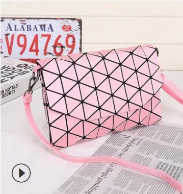 Rhombic ABS shoulder bag in envelope style, available in multiple colours including black and pink.
