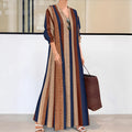 Camel coloured vertical striped V-neck knitted dress with A-line skirt and long sleeves