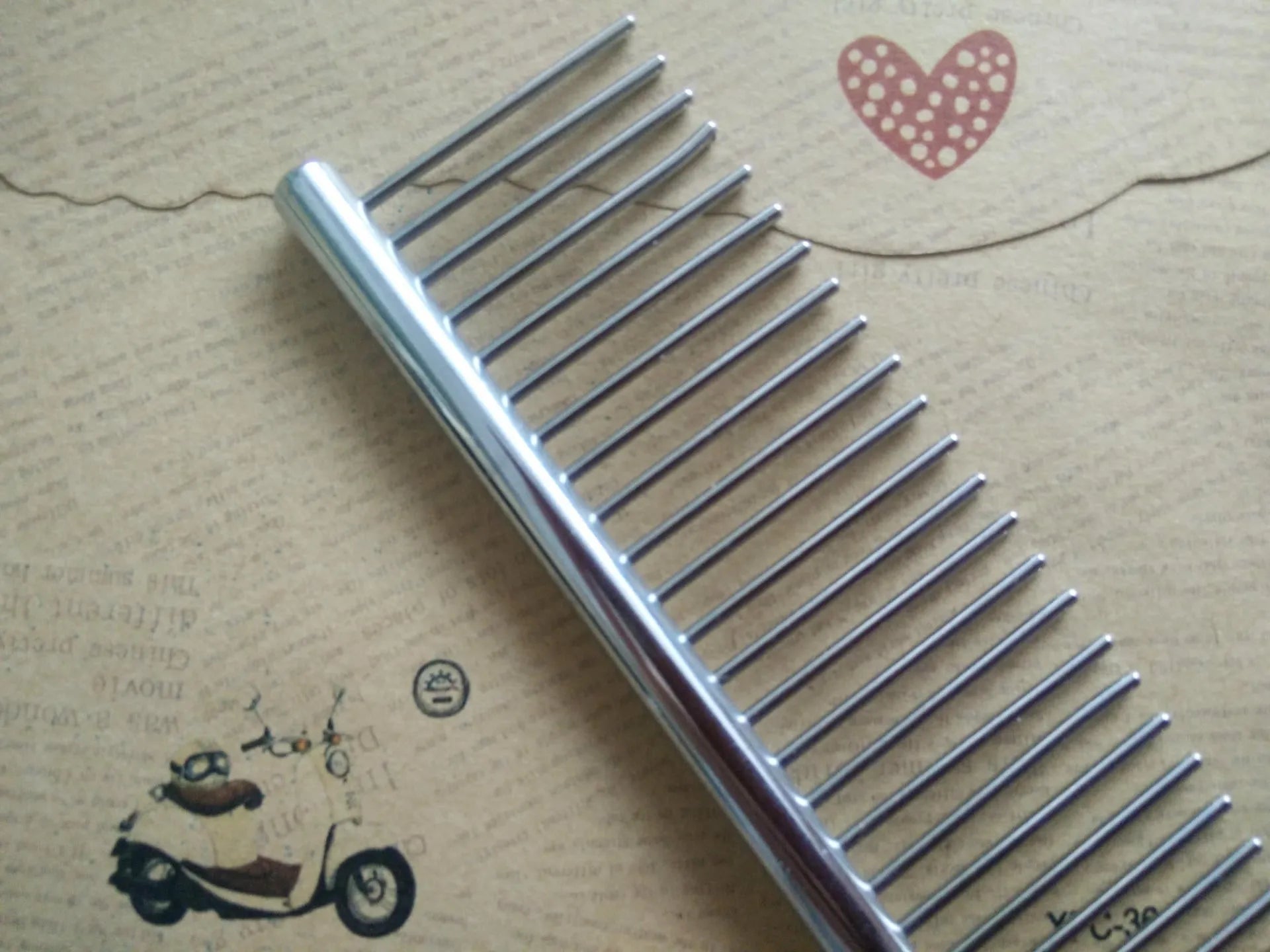 Steel pet grooming comb 19cm x 4.2cm round bar model 1942PY-1 on white background