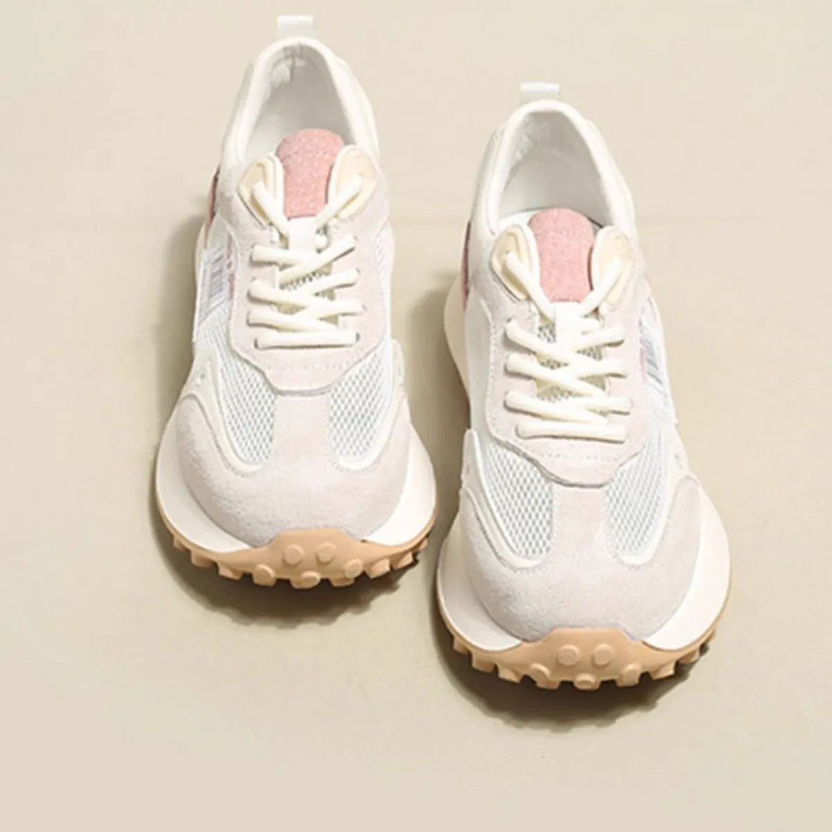 Women's grey and pink retro sneakers with mesh lining and rubber sole in low-top design
