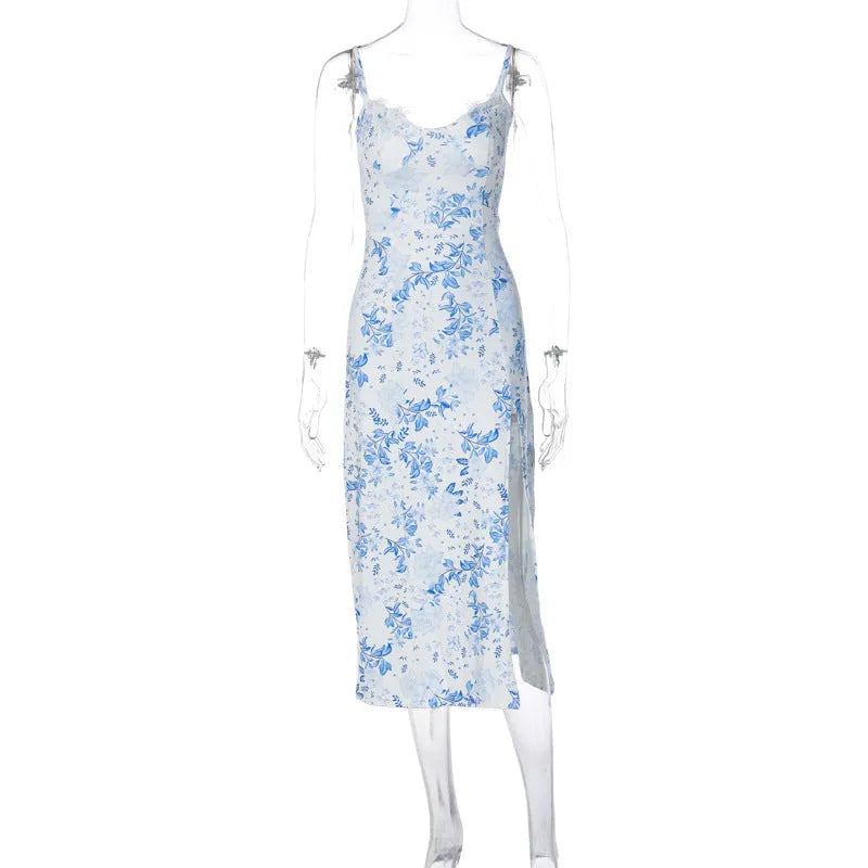 Women's blue lace flower print long dress with black suspender straps and a thigh-high side slit.