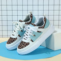 White leopard pattern platform sneakers with soft bottom, mid heel 3-5CM, and lace-up closure