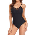 Black solid colour backless one-piece swimsuit laid flat.