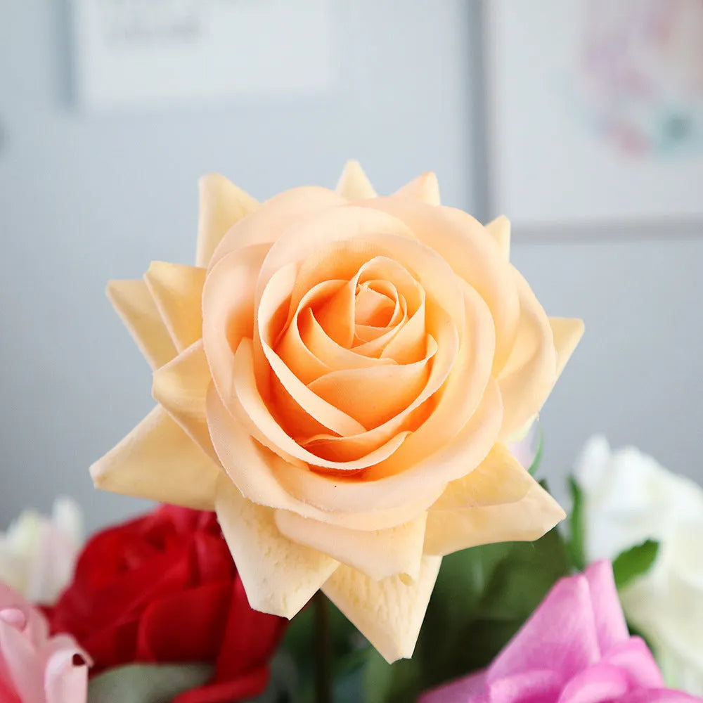 Silk fabric artificial rose bouquet in assorted colours with realistic petals, approximately 42cm long