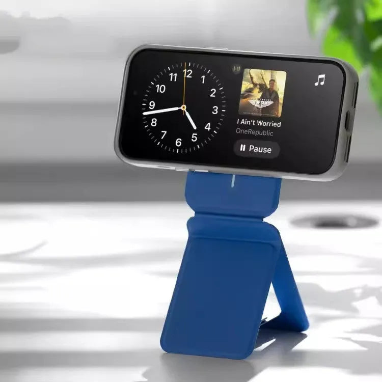 Magnetic mobile phone holder and case in leather with built-in stand, shown in grey.