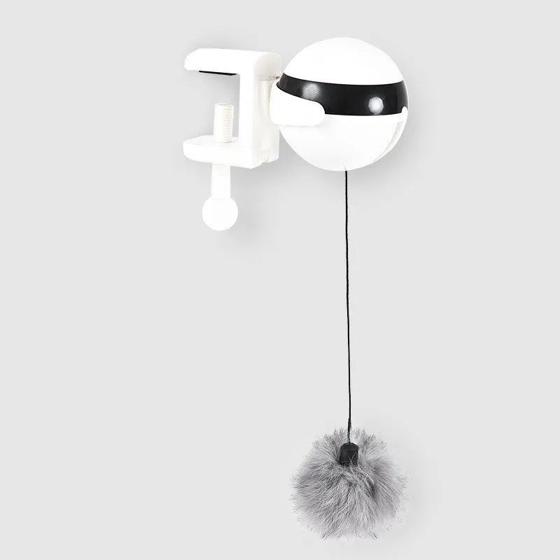 Electric automatic lifting cat toy with rabbit hair teaser and black ABS body on a light floor