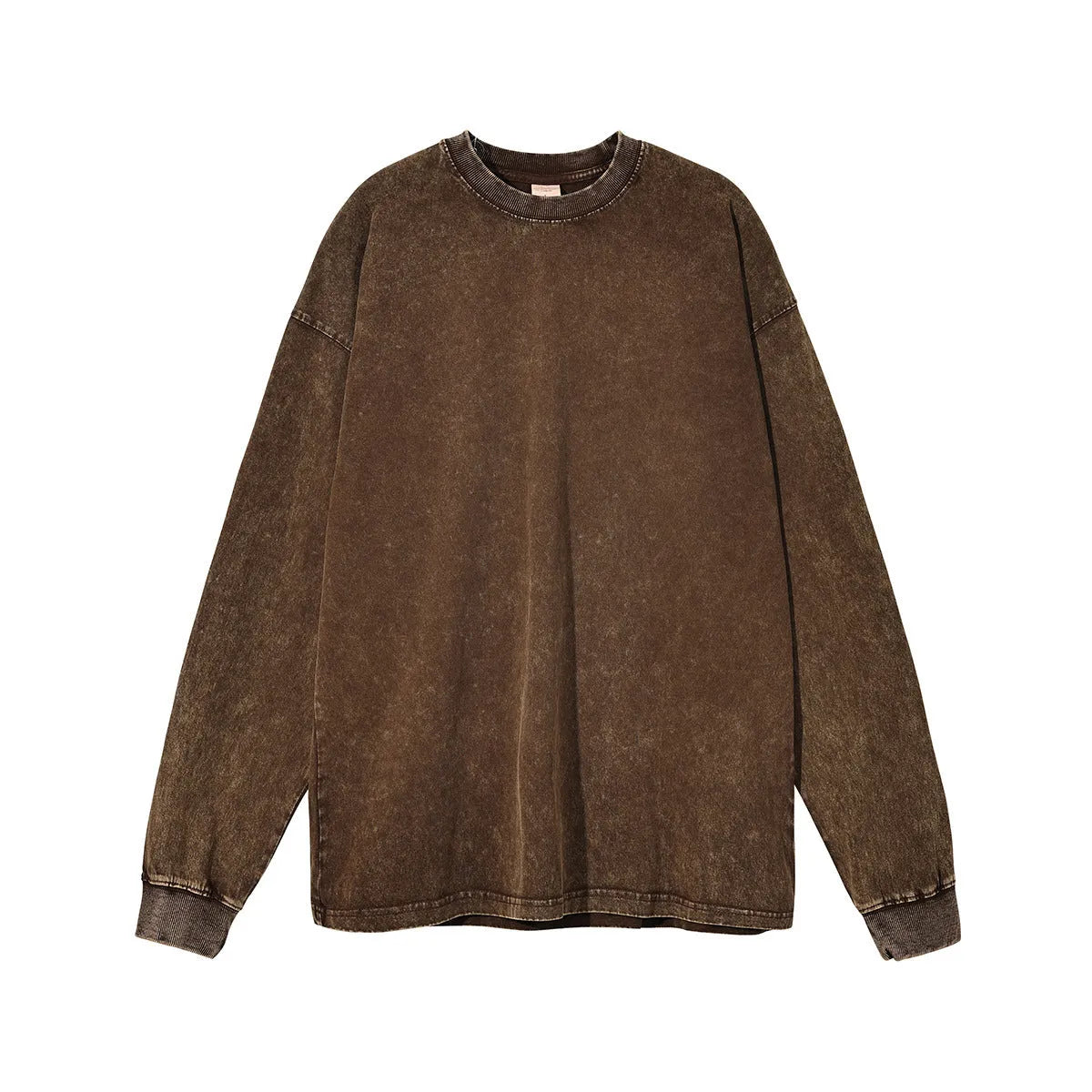 Man wearing a loose fit batik black washed vintage cotton long sleeve pullover.