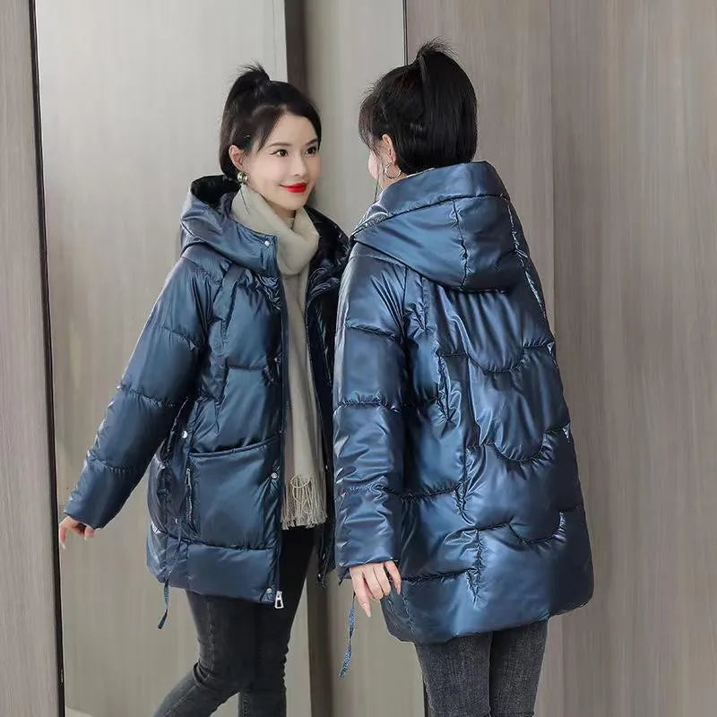 A women's loose-fitting thick hooded winter jacket in an acrylic polyester fabric.