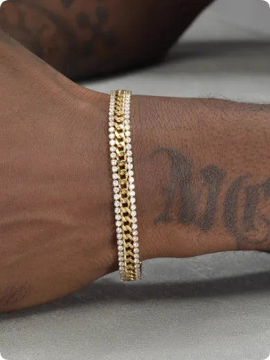 Gold titanium steel tennis bracelet with artificial gemstone inlay on wrist