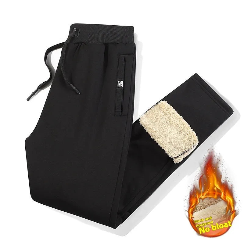 Men's gray fleece-lined track pants with drawstring waist in oversized fit