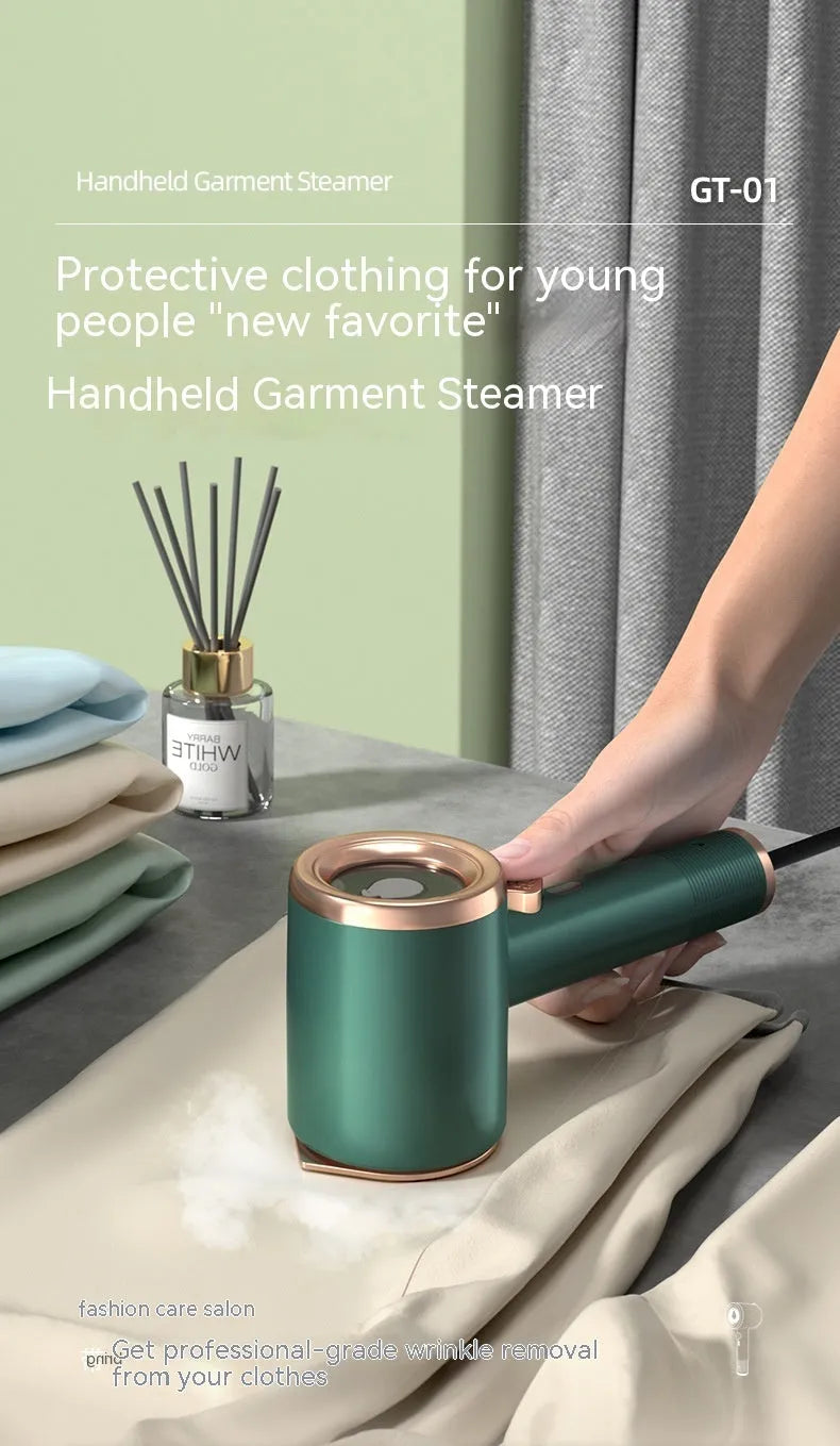Mini handheld garment steamer in green with visual water tank and US plug