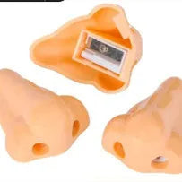 Flesh colour plastic manual pencil sharpener with large shaving container measuring 58x45x30mm