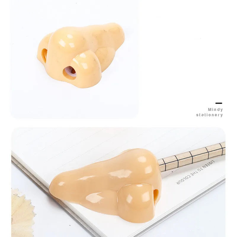 Flesh colour plastic manual pencil sharpener with large shaving container measuring 58x45x30mm