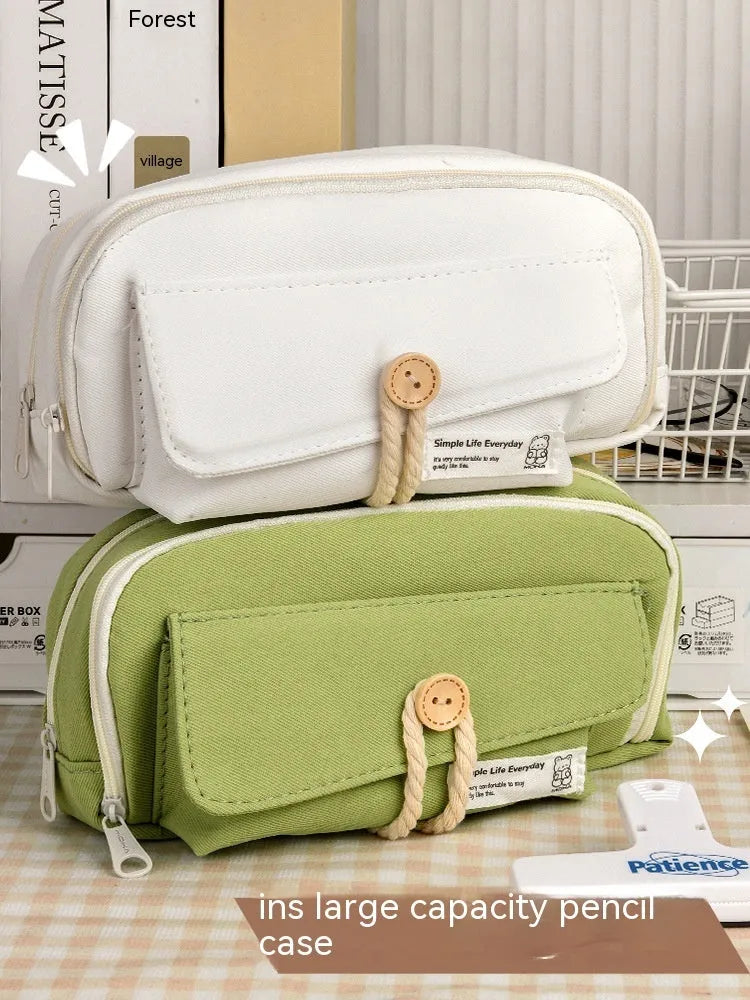 Large capacity Korean style canvas pencil case storing multiple pens in green colour option