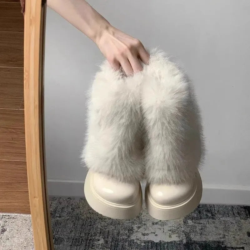 Women's black fleece-lined snow boots with waterproof platform and mid heel