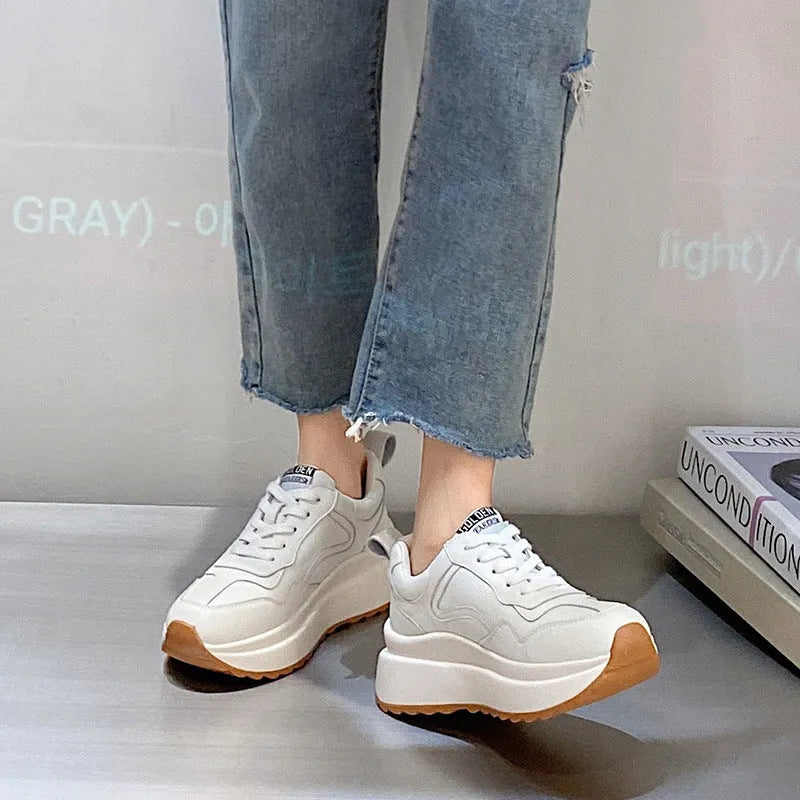 Women's beige-lined white casual sports shoes made from cattlehide leather with an English muffin heel.