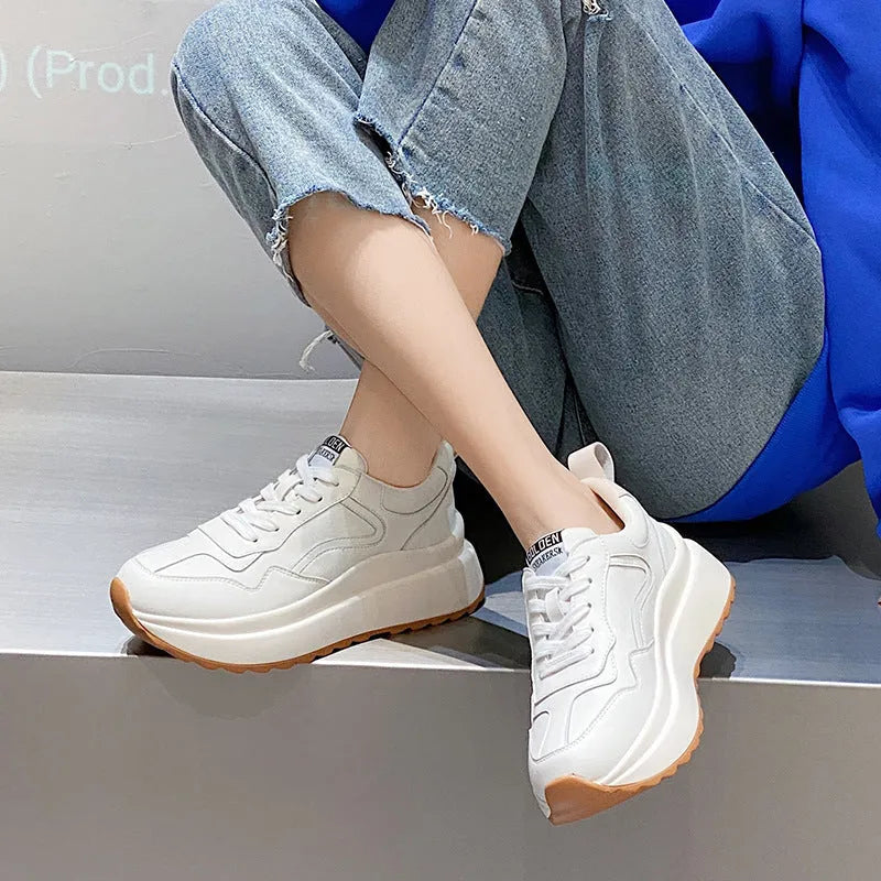 Women's beige-lined white casual sports shoes made from cattlehide leather with an English muffin heel.