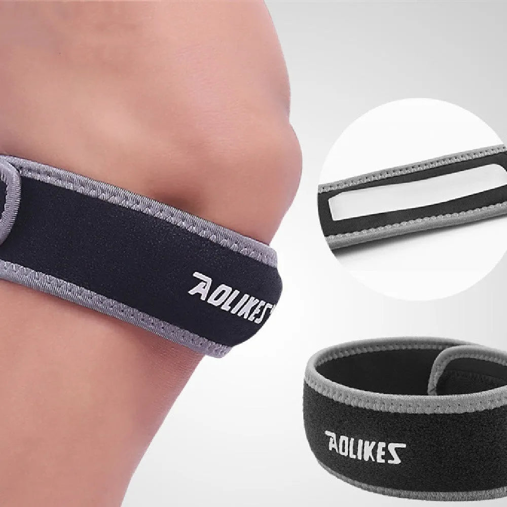 Black and grey patella retinaculum knee strap for adult sports protection during running, football and basketball