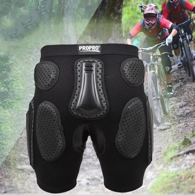 Black cycling hip protection pants showing integrated padding, available in sizes S, M, L, XL.