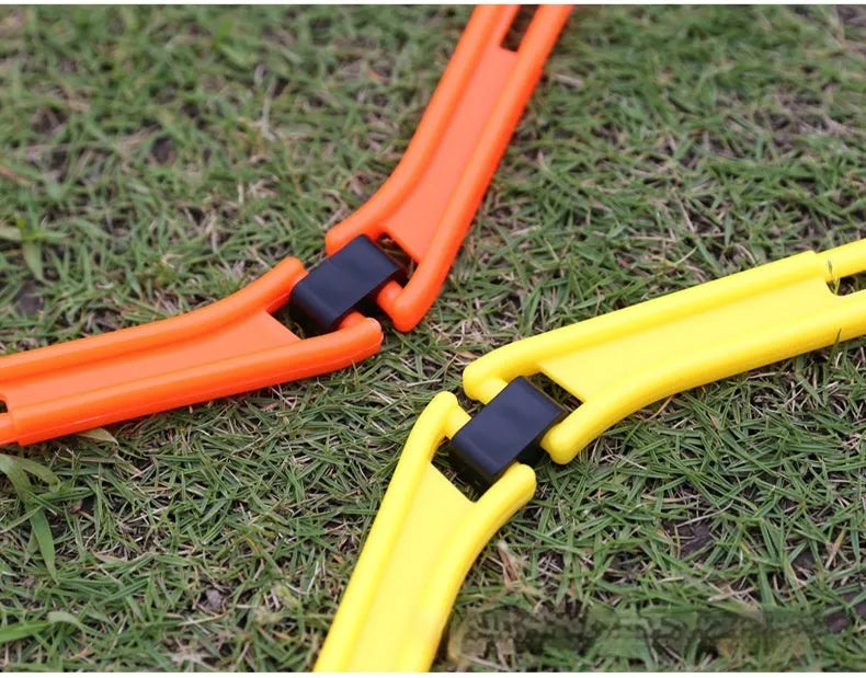 Set of six foldable yellow hexagon plastic agility training rings for sports drills.