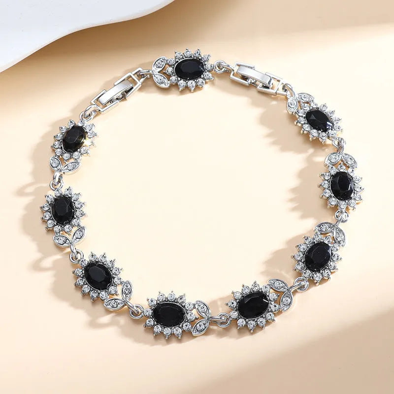 Women's zircon bracelet with electroplated finish in environmentally friendly alloy showing colour options