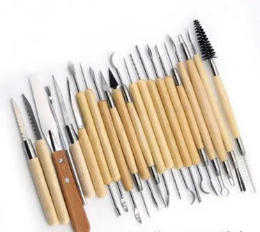27-piece brown pottery clay tool set with stainless steel, wood and plastic tools rolled in a storage bag.