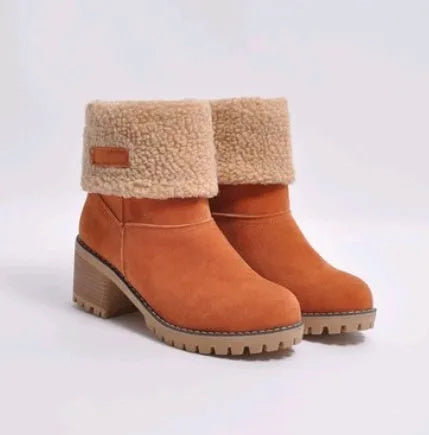 Women's mid-tube suede snow boot in black with a thick heel and round toe.