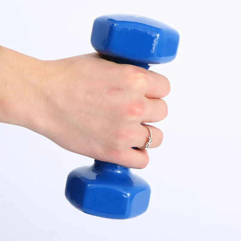 Bright coloured plastic fitness dumbbells with glossy surface for yoga and aerobics