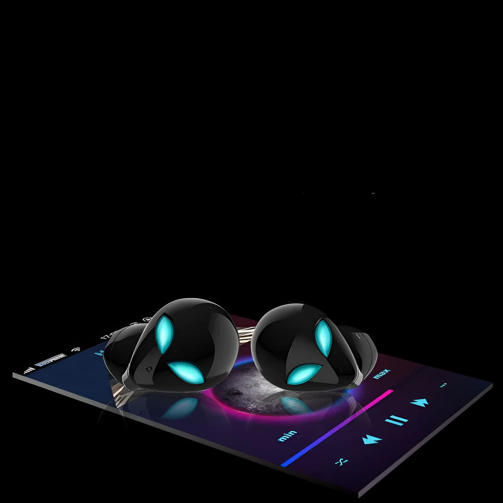 Creative Outer T8 Starman alien design wireless earbuds with LED lights next to charging case.