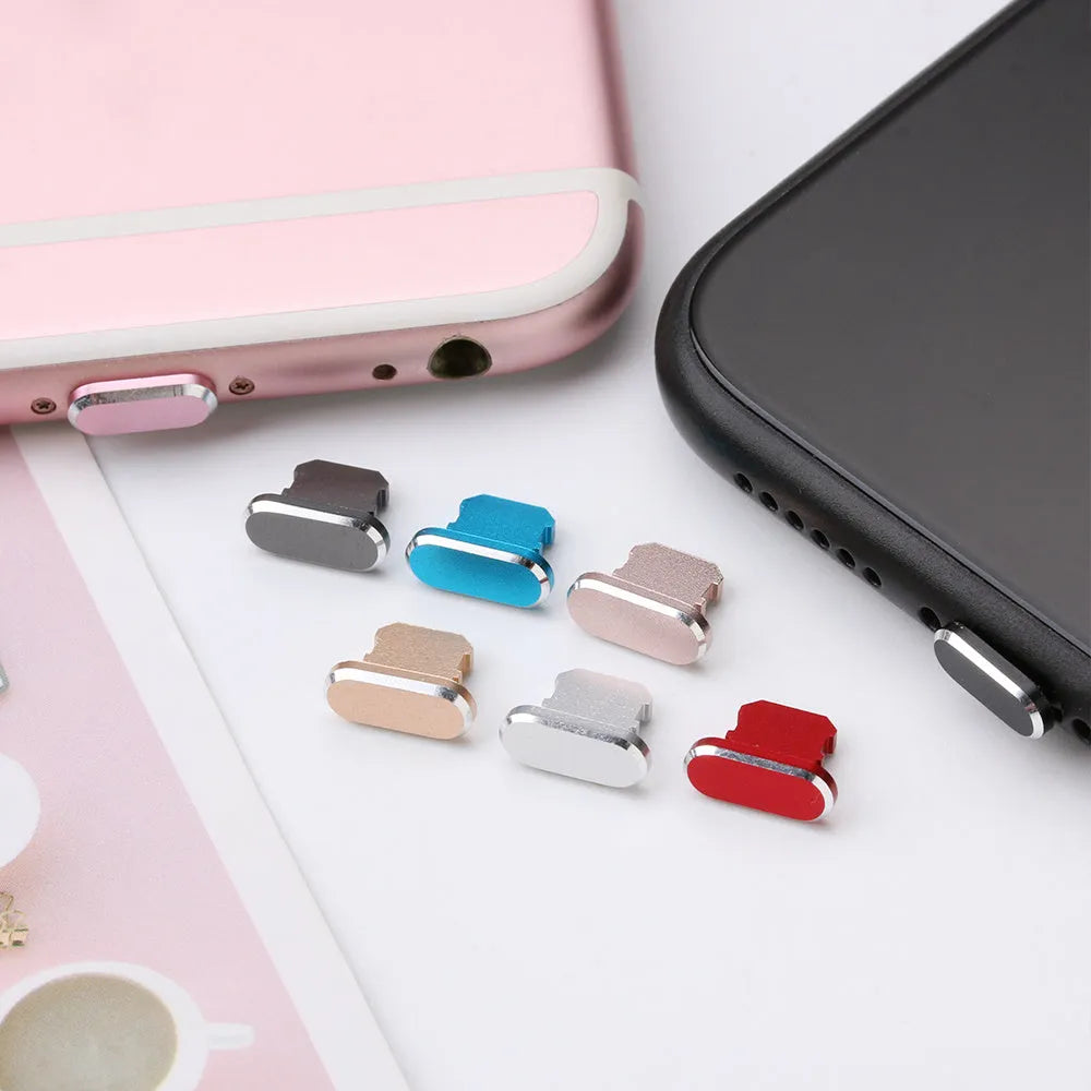 Aluminium alloy charging port dust plug for iPhone in various colours including gold, silver, and rose gold.