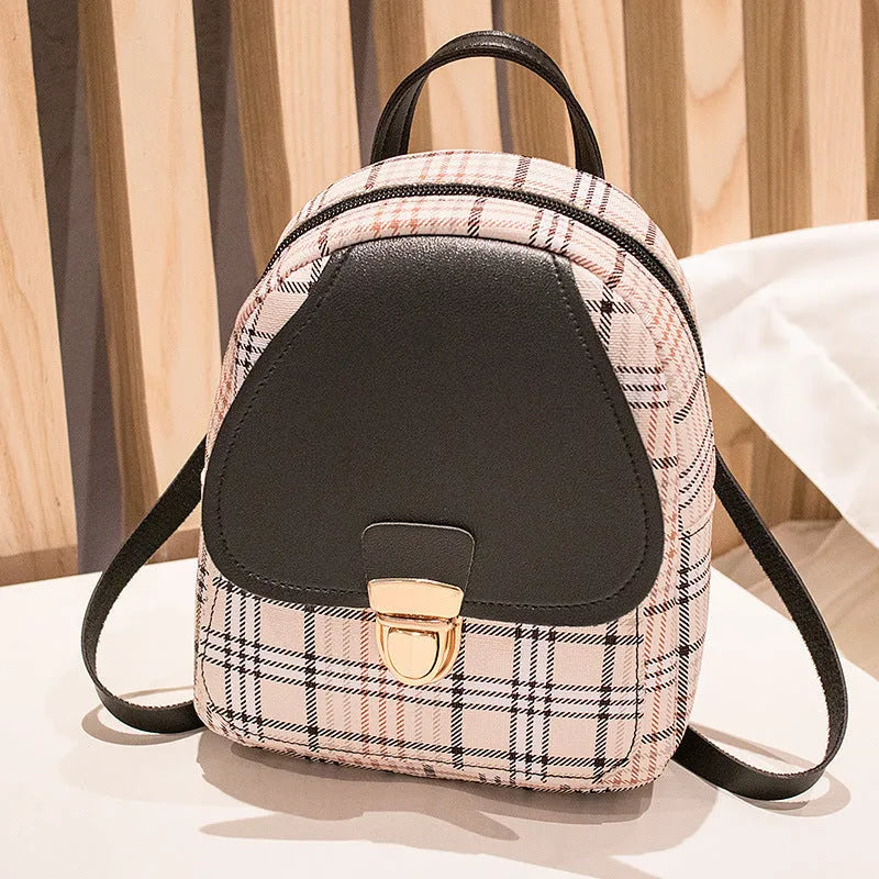 Diagonal one shoulder phone bag in PU leather available in five colours.