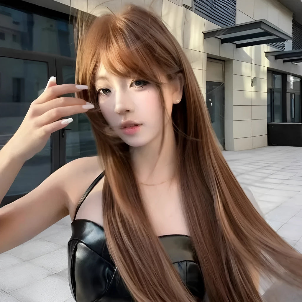 Warm tea chestnut brown long straight synthetic wig with fringe on a model or stand.