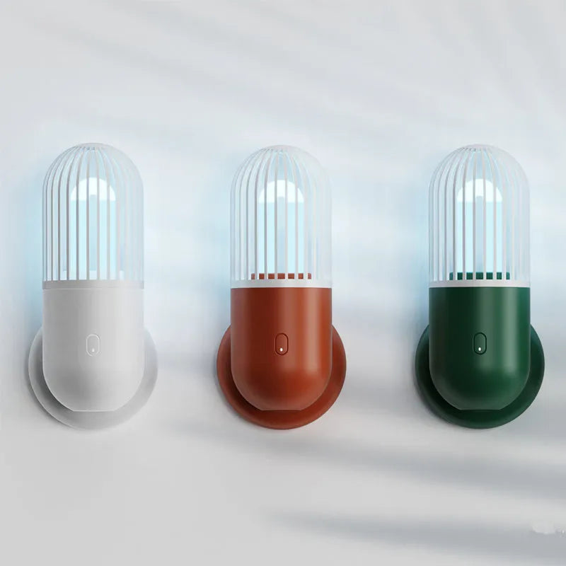 Portable capsule ultraviolet disinfection lamp in black, brown, green or white with dimensions 52x52x136mm