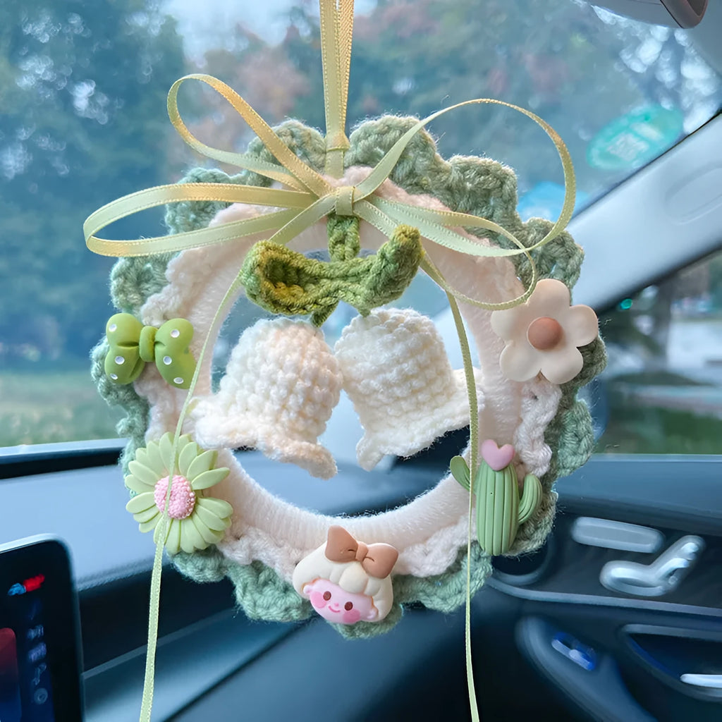 Woven wool bell orchid car pendant in green, pink, purple, and yellow colour options with dream catcher variations
