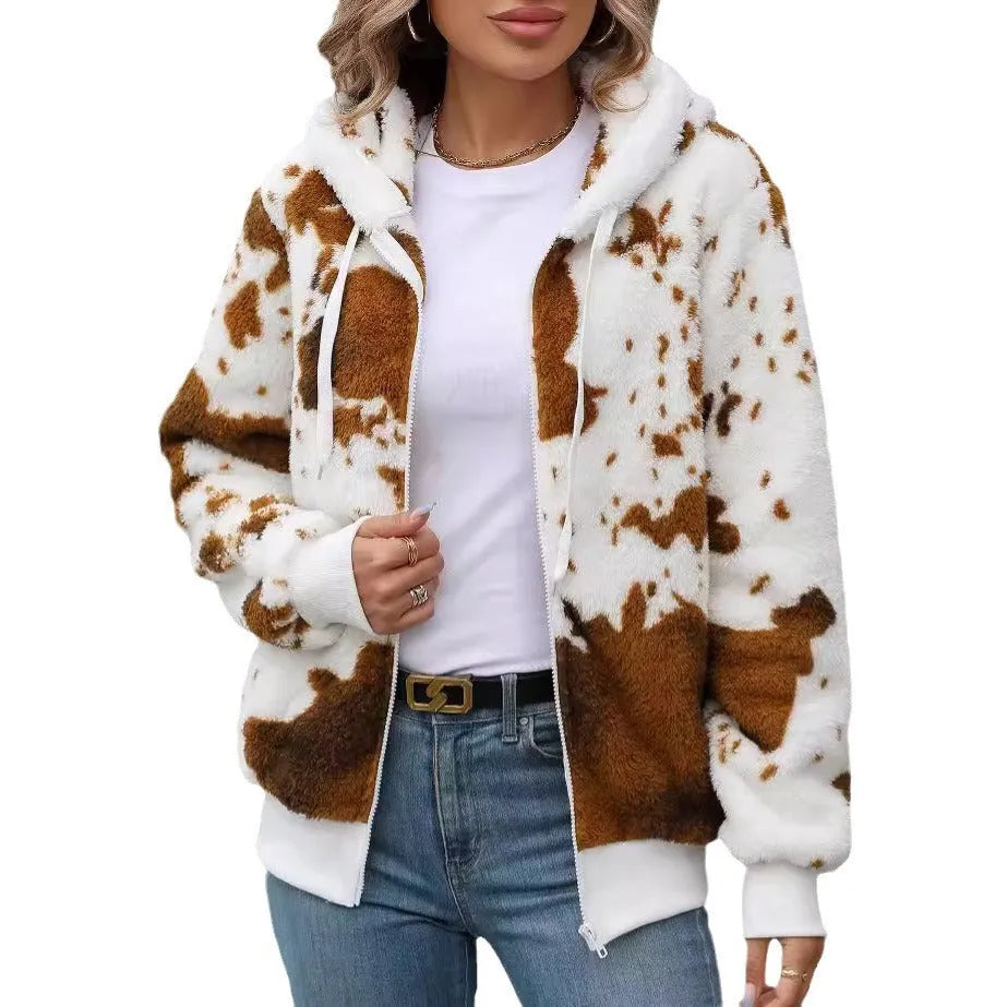 Yellow brown cow print hooded zip-up cardigan jacket on a hanger