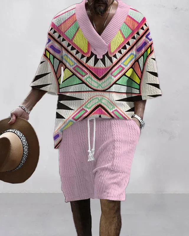 Man wearing a loose fit casual short sleeve top and matching shorts suit set