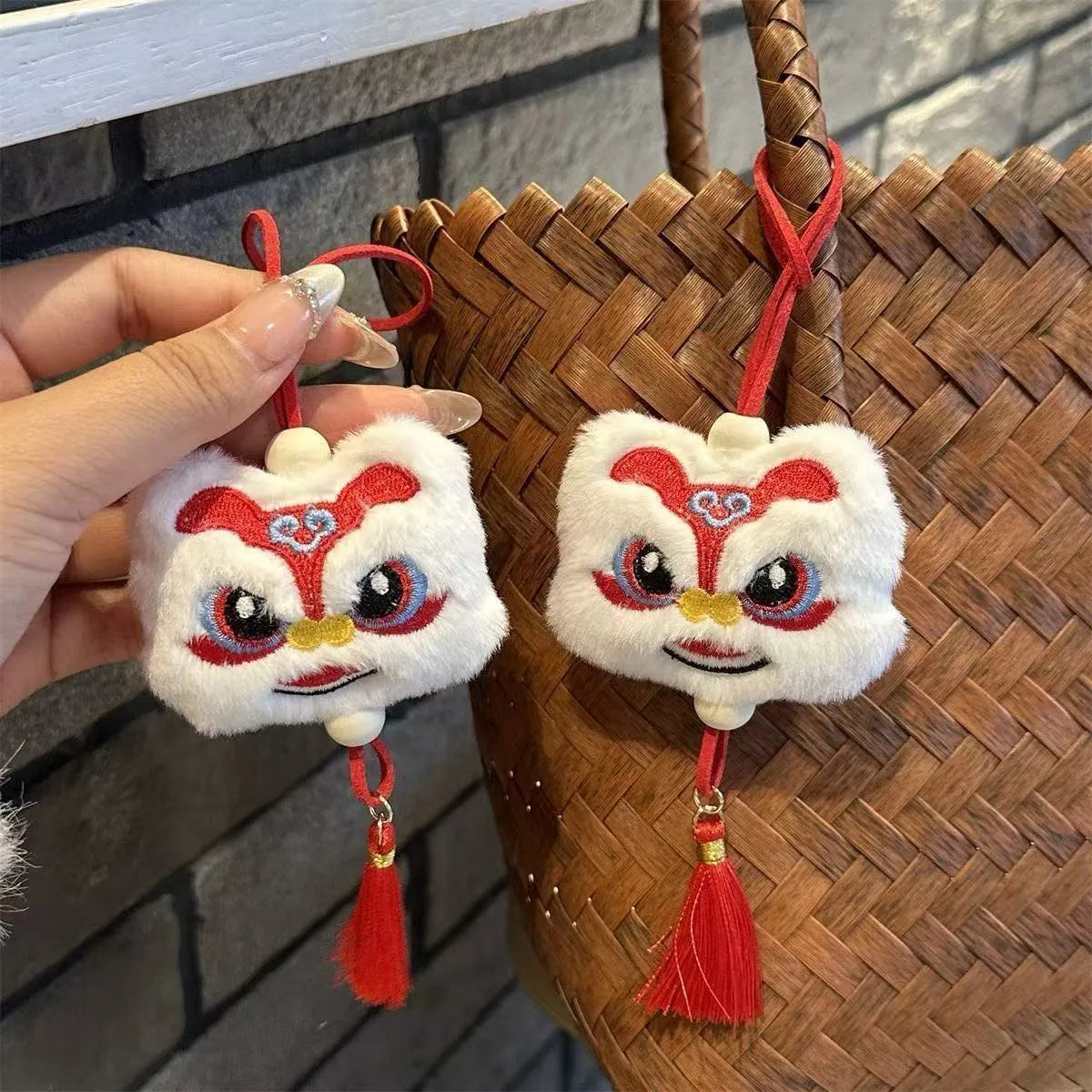Chinese style blue plush lion keychain ornament with star stone detail and cartoon styling