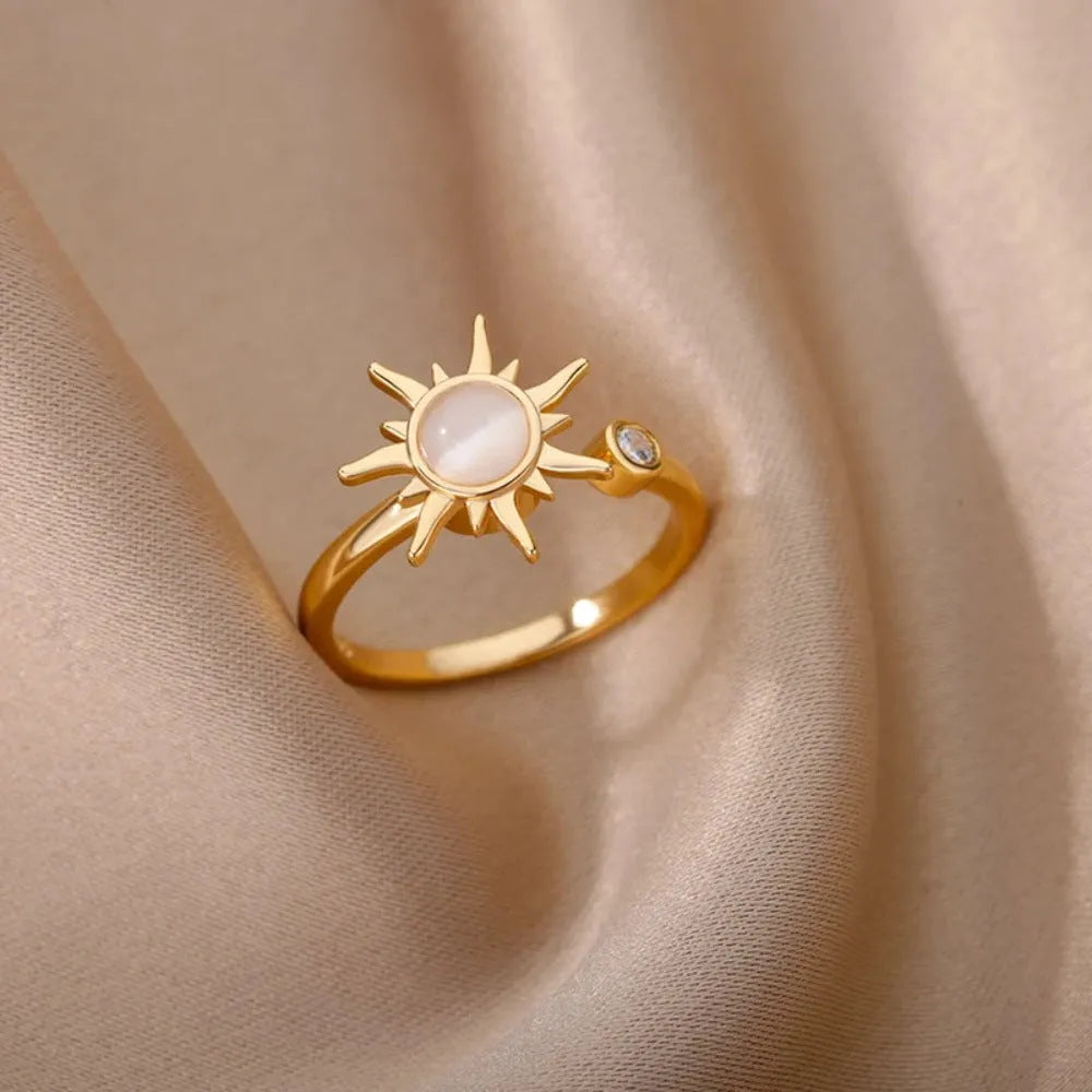 Adjustable copper decompression ring with rotating mechanism in gold electroplated finish