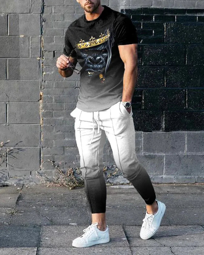 Men's short sleeve printed top and trouser sport suit set in polyester blend fabric.
