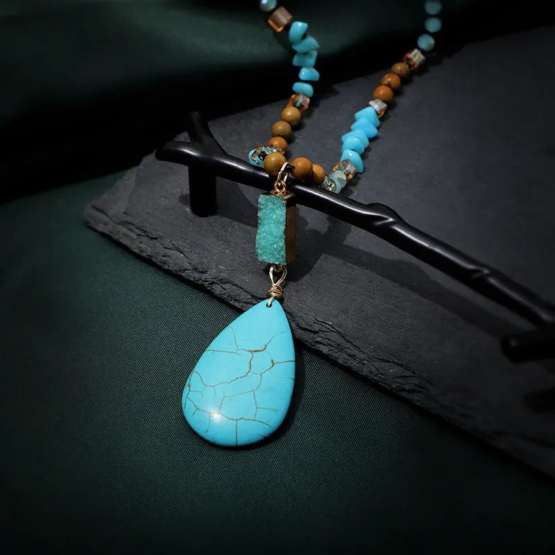 Turquoise blue big water drop pendant necklace with heart-shaped mixed gem design on ball bead chain