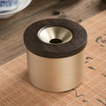 Brass ashtray with wooden lid featuring retro design for living room decor