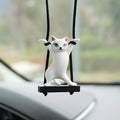 Resin cartoon cat pendant for car interior decoration on a 25 cm adjustable rope.