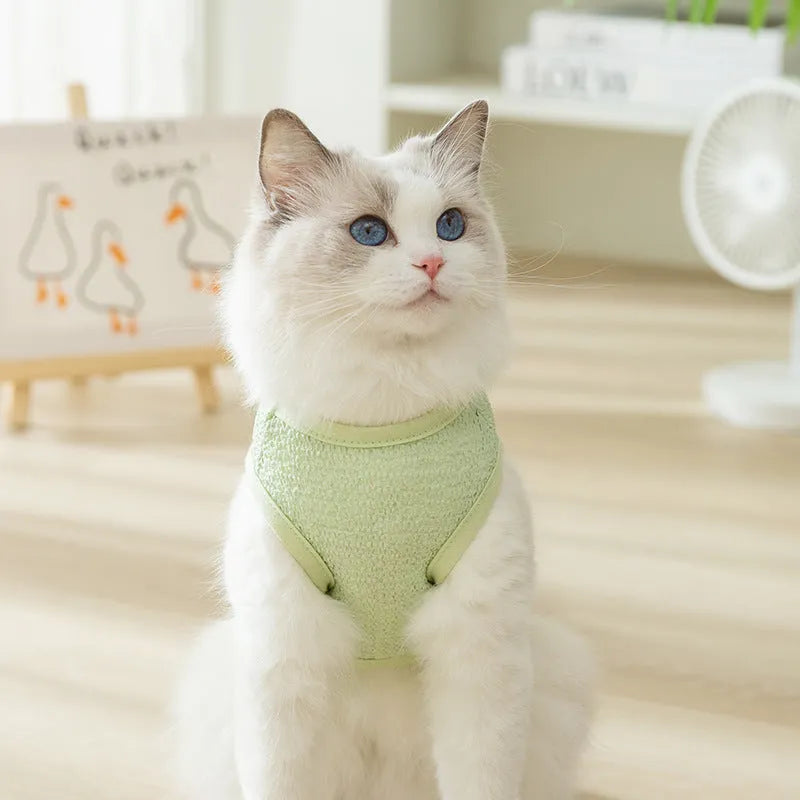 Green knitted cat top with hollowed-out design and a bear cartoon patch on the side